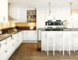 White Kitchen Cabinet Design with Built-In Kitchen Appliances (Source: Newmatic Kenya)