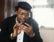 Man in Black Suit Jacket Holding Black Smartphone (Image Credit: Artem Podrez on Pexels)