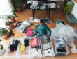 A lady decluttering her home (Image Credit: Getty Images)