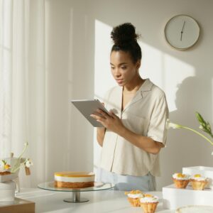 Image shows a lady using an Ipad
