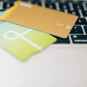 Close-Up Shot of Credit Cards on Laptop Keyboard (Image Credit: Photo by Leeloo The First)